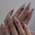 Künstlerisches Press-On Nagelset mit dekorativem Marmor und glänzenden Akzenten Brehn