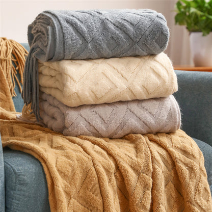 Gemütliche Strickwurfdecke