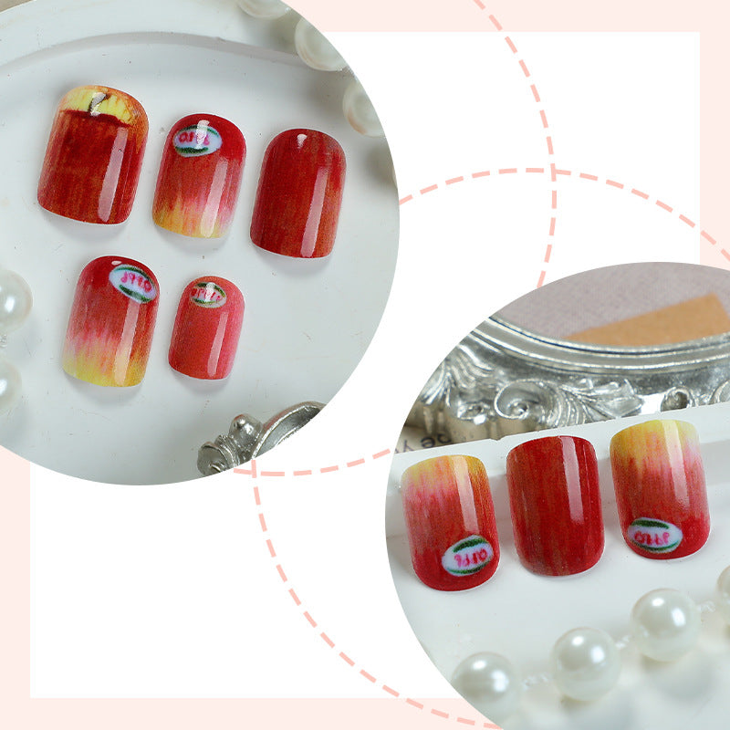 Künstlerisches Press-on-Nail-Set mit einzigartigen Apfel-Designs Brehn