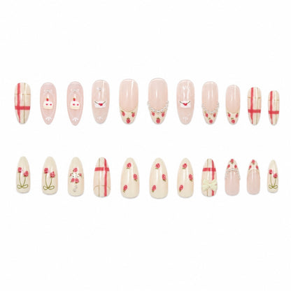 Dekoratives Press-On Nagelkunstset mit Blumen- und Schleifendesigns Brehn