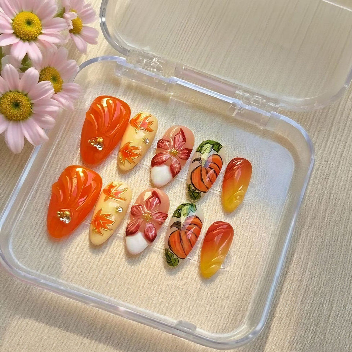 Kunstnagelset mit floralen und herbstlichen Designs Brehn
