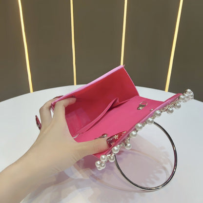 Perlenakzentierte Abend-Clutch