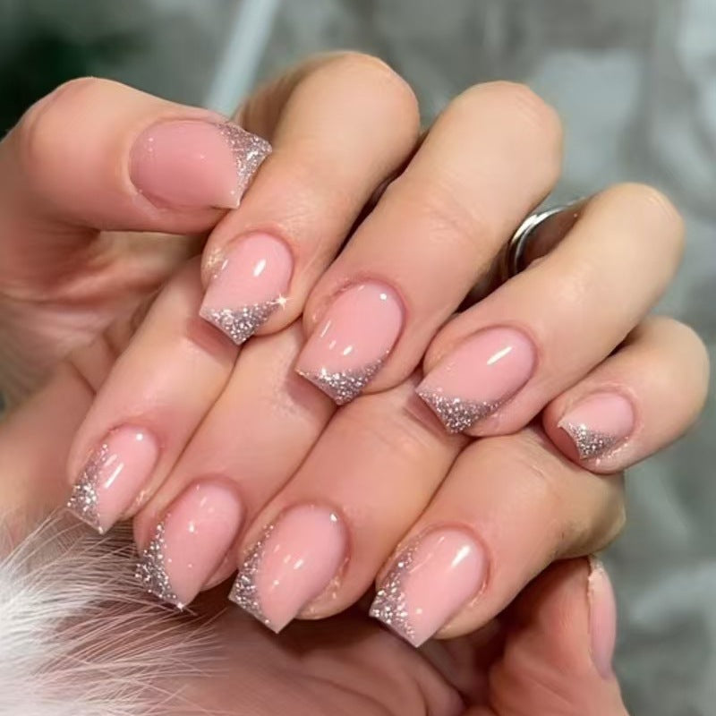 Kunstnagelset mit schimmernden Glitterspitzen Brehn