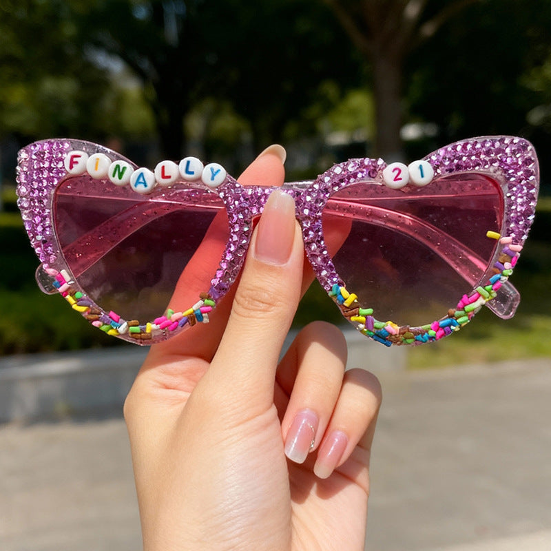 Dekorative Katzenaugen-Sonnenbrille mit Rhinestones Brehn