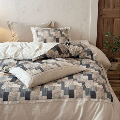 Moderne Patchwork-Bettwäschegarnitur in Leinenoptik mit Wende-Design