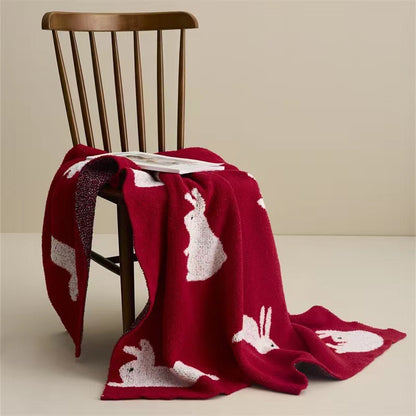 Kuscheldecke aus Jacquardstrick mit Hasenmotiven Brehn