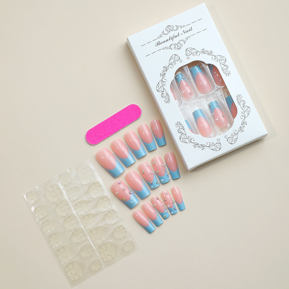 Premium Dekorative Press-On-Nagelset mit eleganten blauen Spitzen und Juwelenakzenten Brehn