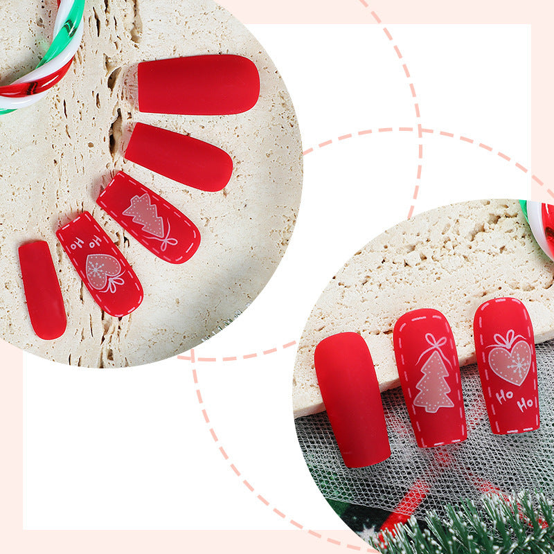 Weihnachtskunstnagelset mit festlichen Motiven und Glitzerakzenten Brehn