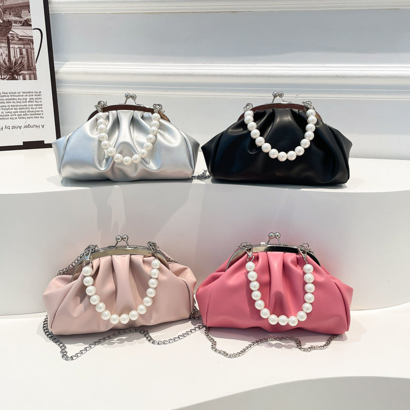 Elegante Clutch-Handtasche mit Perlenkette Brehn
