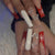 Festliches Press-On Nagelset mit Glitter und dekorativen Akzenten Brehn