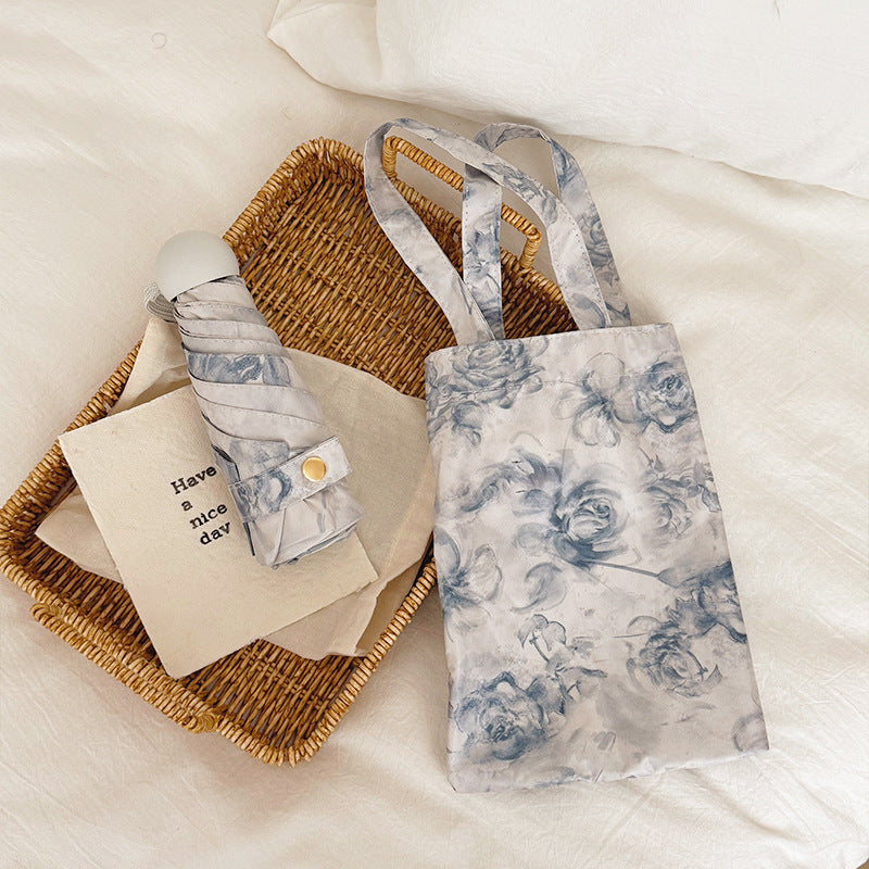 Damen Faltbarer Regenschirm mit floralen Motiven und Tragetasche Brehn