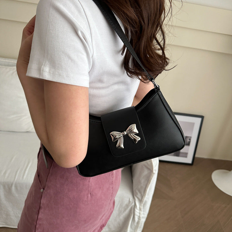 Stylische Schleifenakzent-Handtasche Brehn
