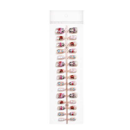 Verspielte Themen Press-On Nagelkunst Brehn