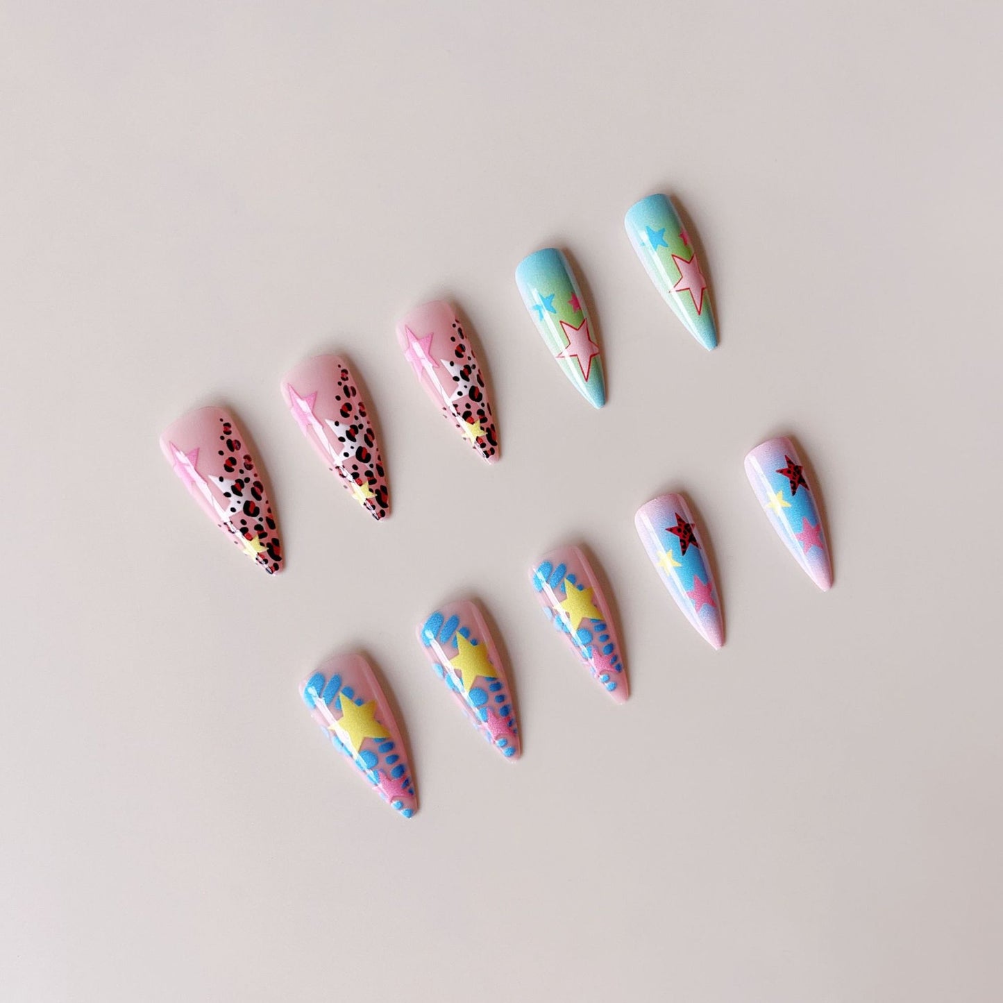 Kunstnagelset mit bunten 3D-Sternmotiven Brehn