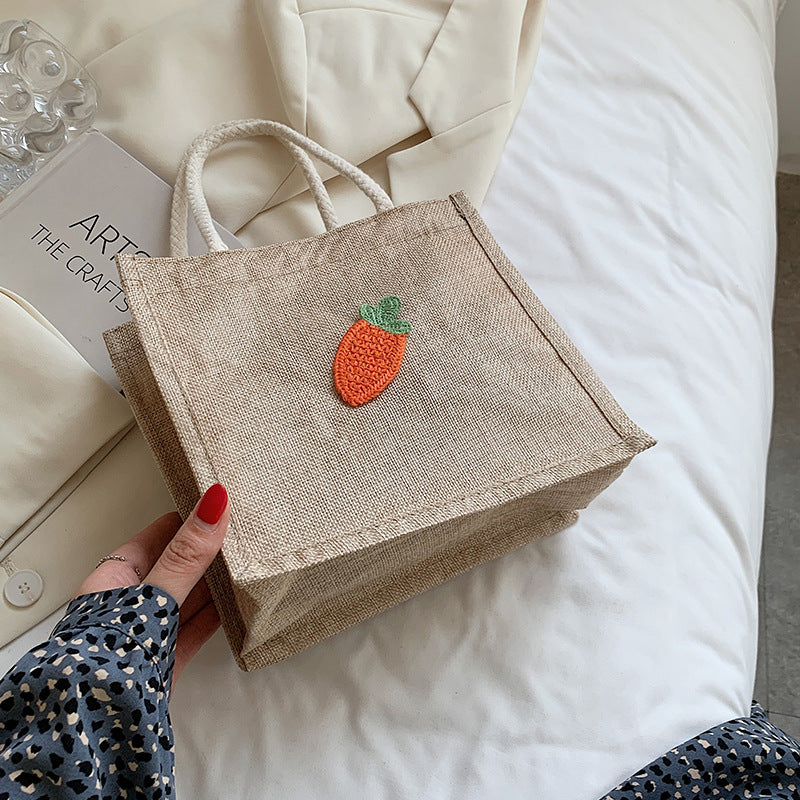 Dekorativer floraler Akzent Handtasche