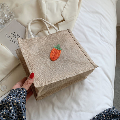 Dekorativer floraler Akzent Handtasche