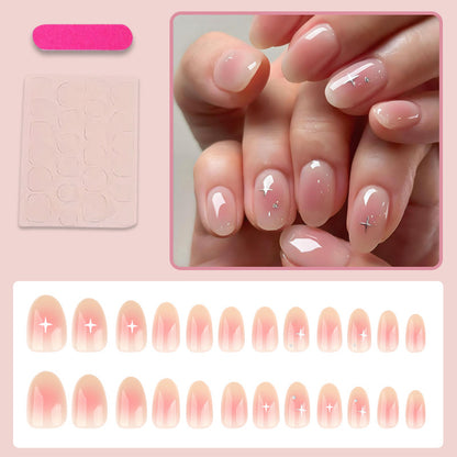 Kunstnagelset mit elegantem French-Akzent und Glitzerdetails Brehn