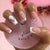 Kunstvolle Nageldesigns mit Herz- und Glitzerakzenten Brehn