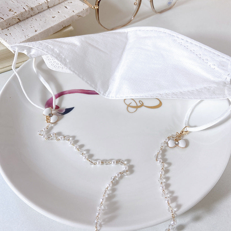 Elegante Ohrringe mit Perlen und Blütenanhängern Brehn