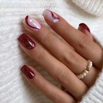 Glamouröses Kunstnagelset mit Glitzer- und Glamourakzenten Brehn