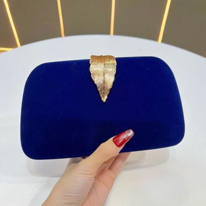 Elegante abendhandtas mit Blattakzenten