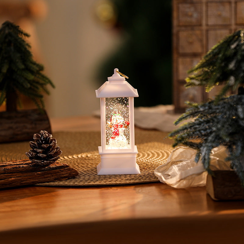 Beleuchtete Weihnachtslaterne mit glitzerndem Schneemann-Szenario Brehn