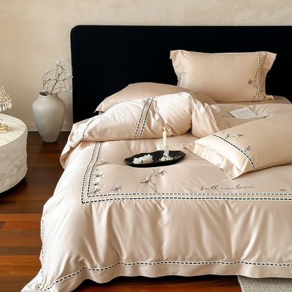 Besticktes Luxus-Satin-Bettbezug-Set mit dekorativen Kissenbezügen