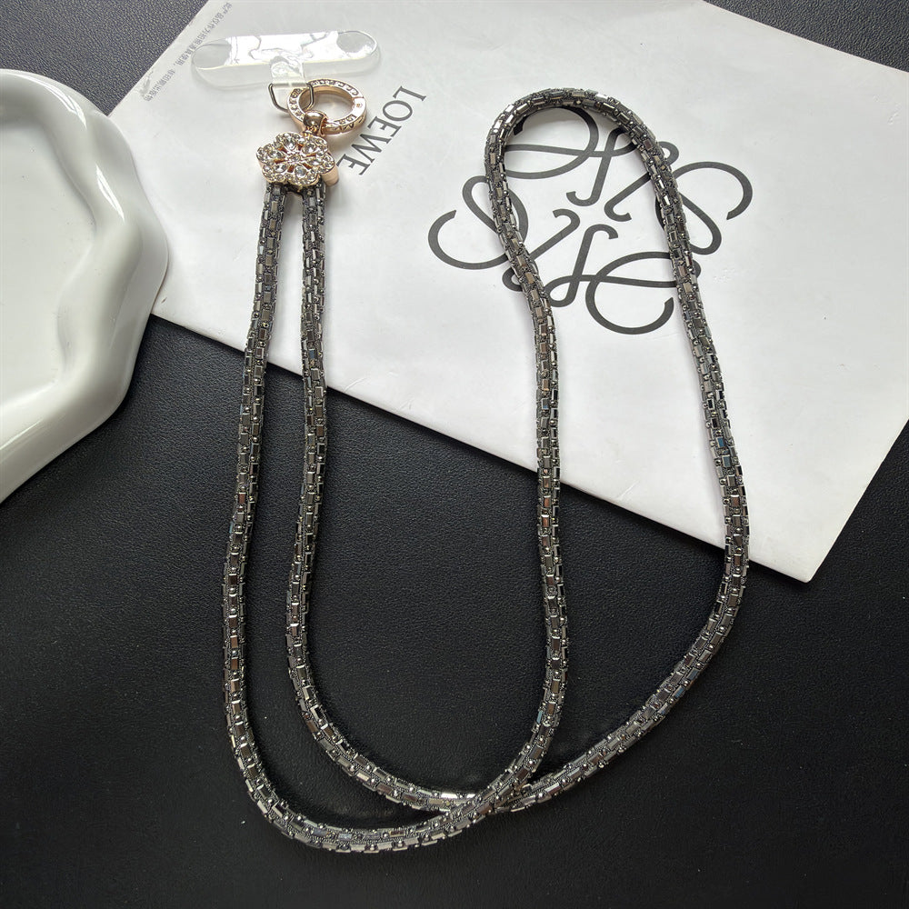 Dekorativer, mit Kristallperlen verzierter Brillenband Brehn