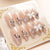Glamouröse Schmetterlings-verzierte Press-On Nagelkunst Brehn
