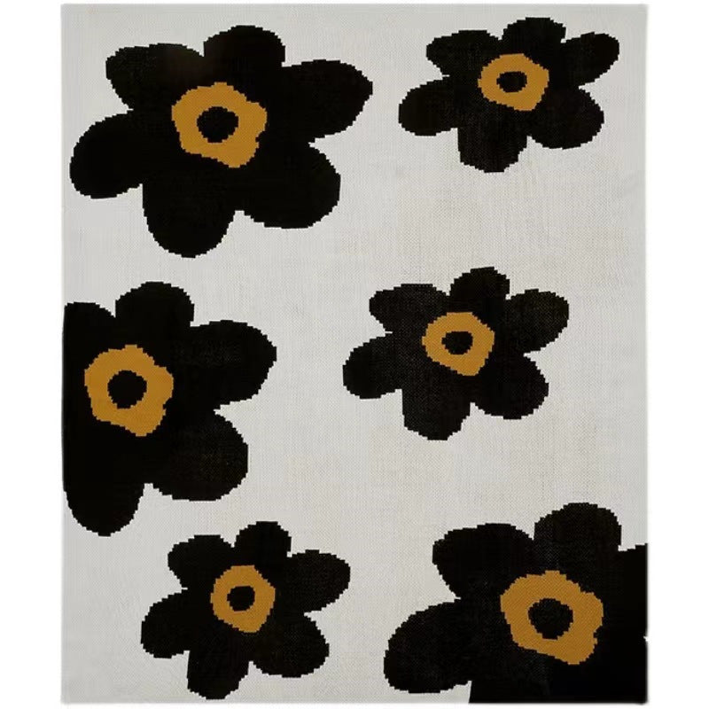Blumengemusterte Strick-Wurfdecke