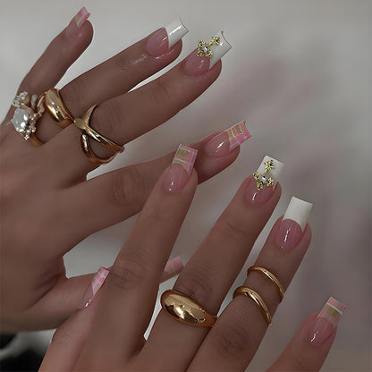 Kunstnagelset mit eleganten French-Tipps und modernen Akzenten Brehn