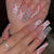 Künstlerische Glitzer- und Herzdesign Press-On Nagelverlängerungen Brehn