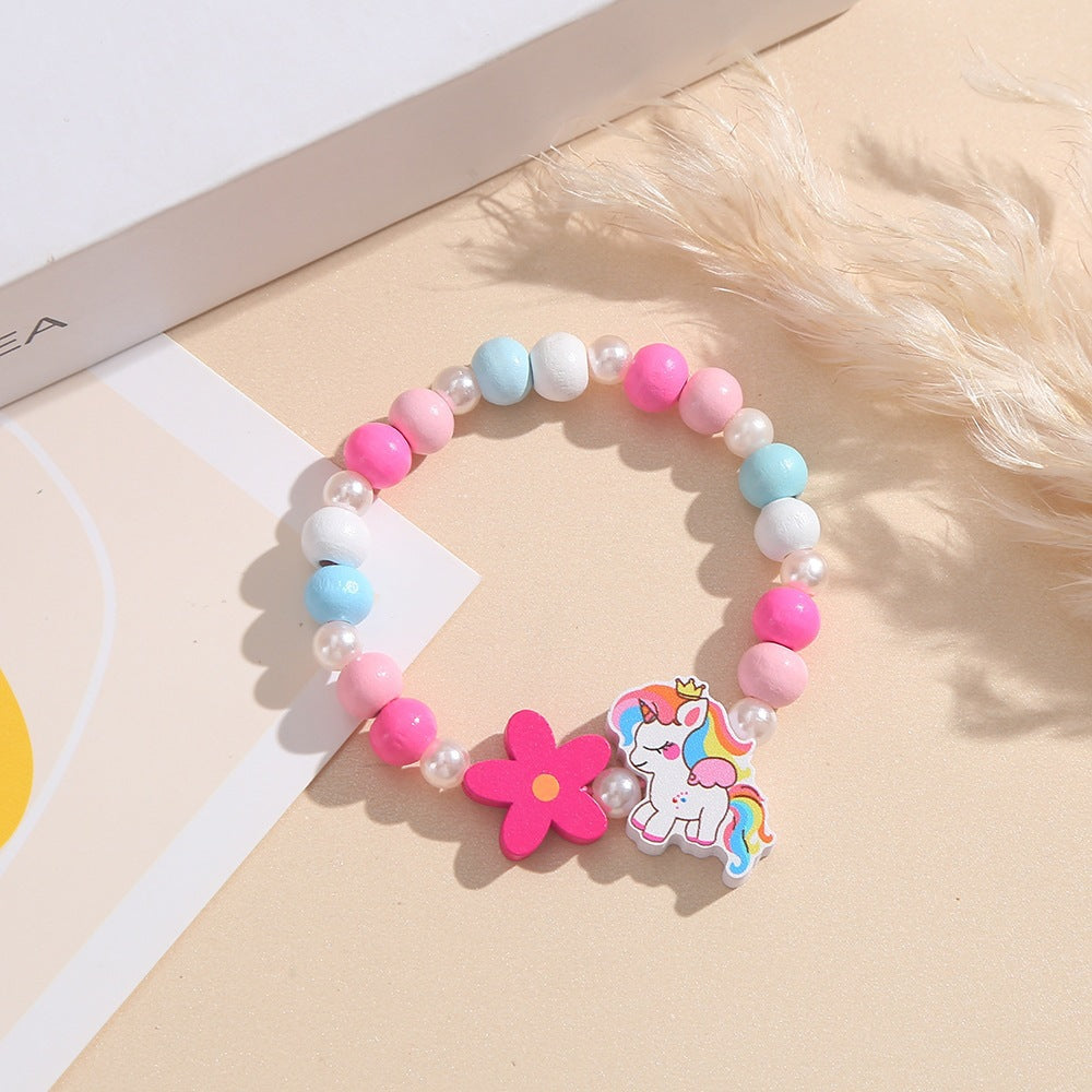 Verspieltes Kinderarmband mit Einhorn- und Blumenmotiv Brehn
