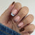 Stylisches dekoratives Press-On-Nagelset mit trendigen Mustern Brehn