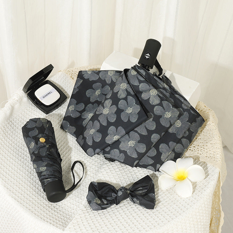 Damen Mini Faltregenschirm mit elegantem Blumendruck Brehn