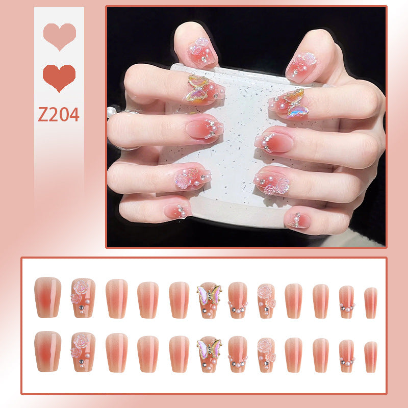 Kunstnagelset mit filigranen 3D-Blüten und strahlenden Glitzerakzenten Brehn