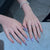 Künstlerisches Stiletto Press-On Nageldesign-Set mit floralen Elementen Brehn