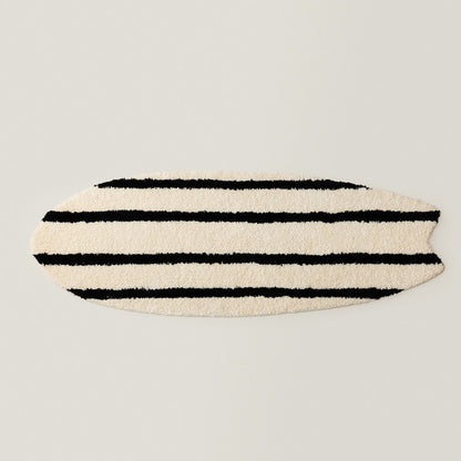 Surfboard-förmige dekorative Badematte Brehn