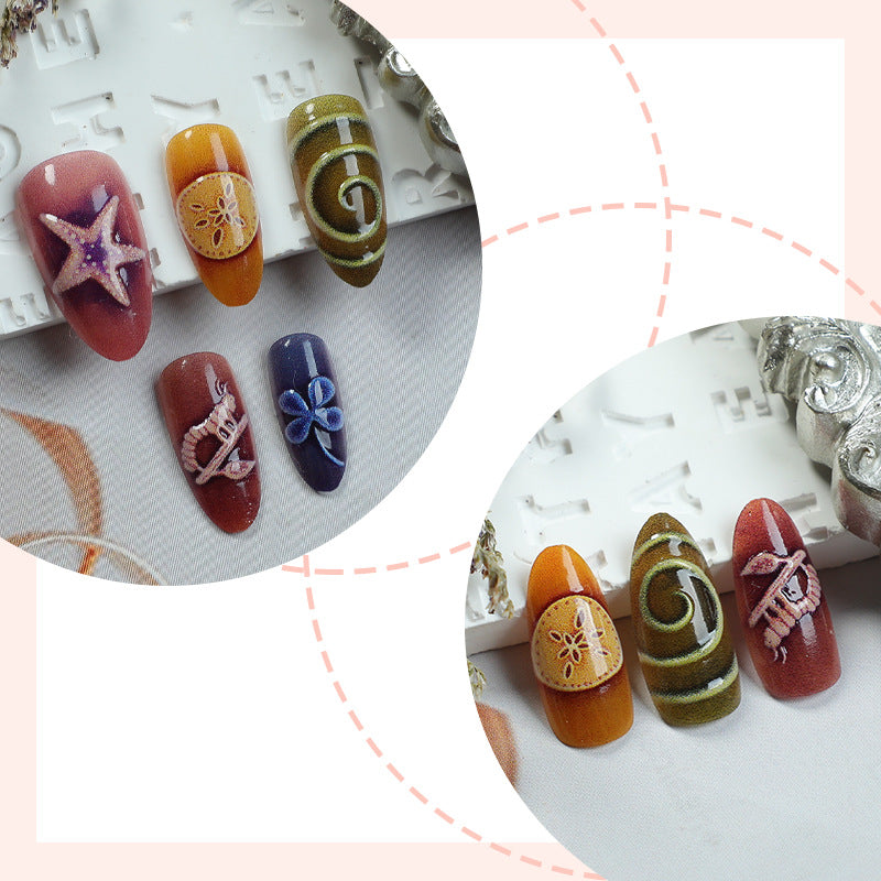 Kunstnagelset mit kreativen maritimen und naturinspirierten Motiven Brehn
