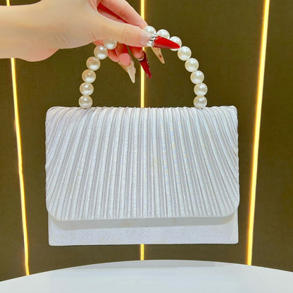 Faltende elegante Abendhandtasche