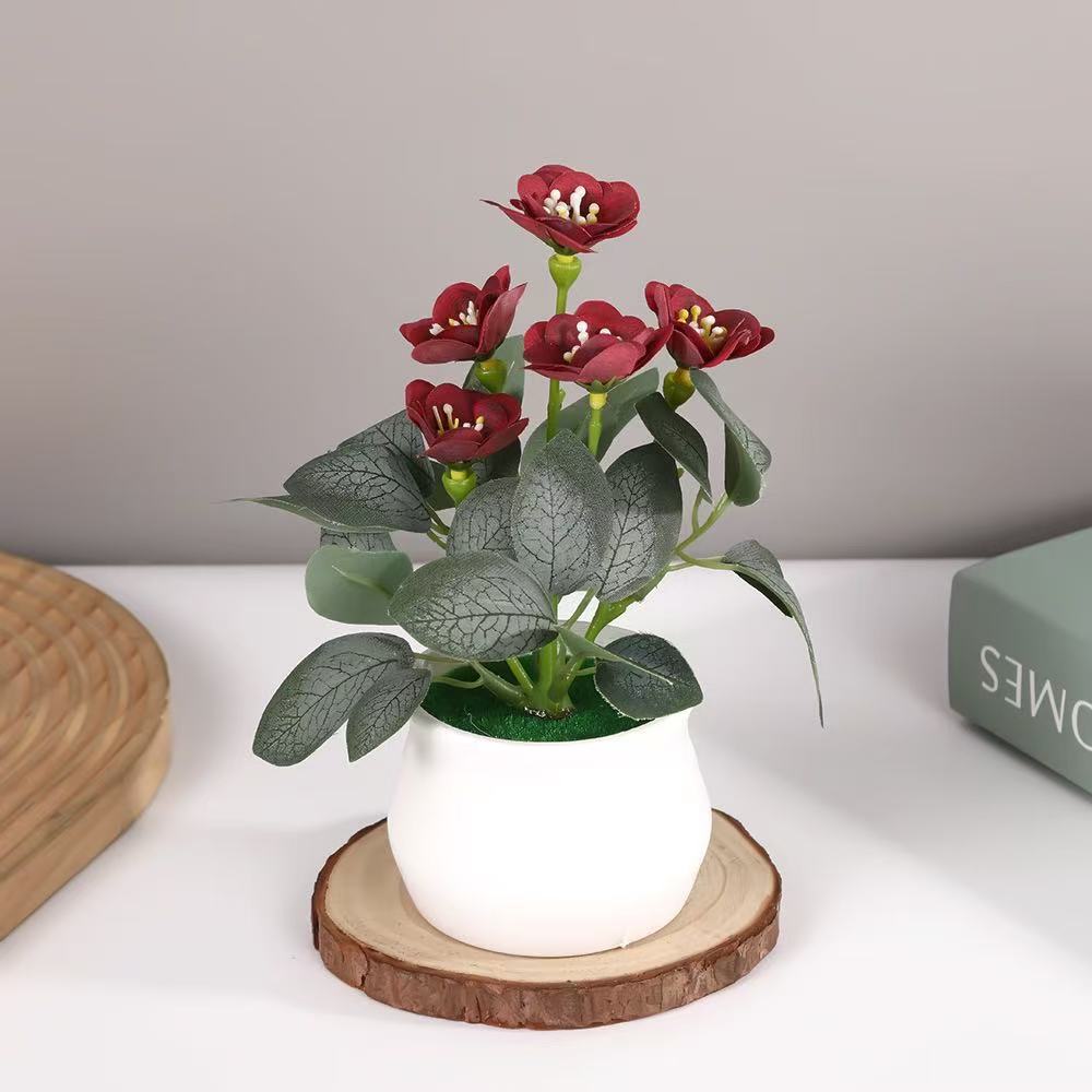 Künstliches Blumenarrangement für die Wohnkultur展示