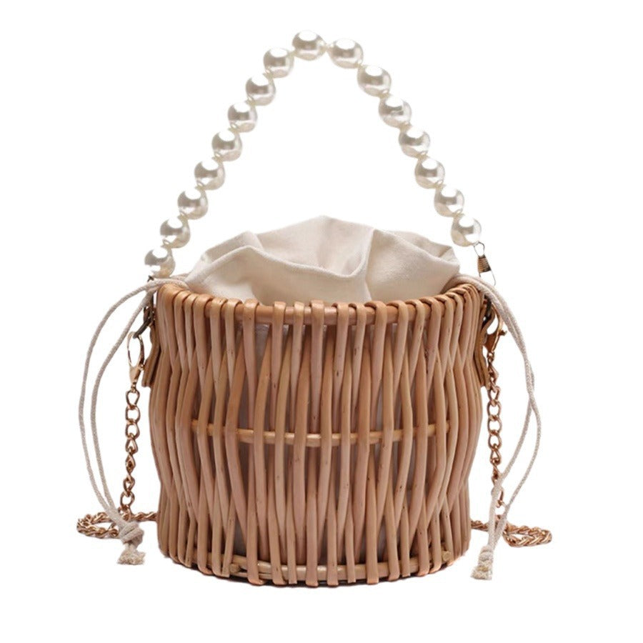 Damen Handtasche mit elegantem Perlengriff und geflochtenem Design Brehn