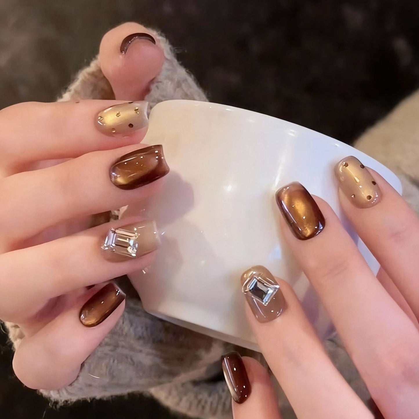 Kunstnagelset mit eleganten Ombre-Designs und funkelnden Akzenten Brehn