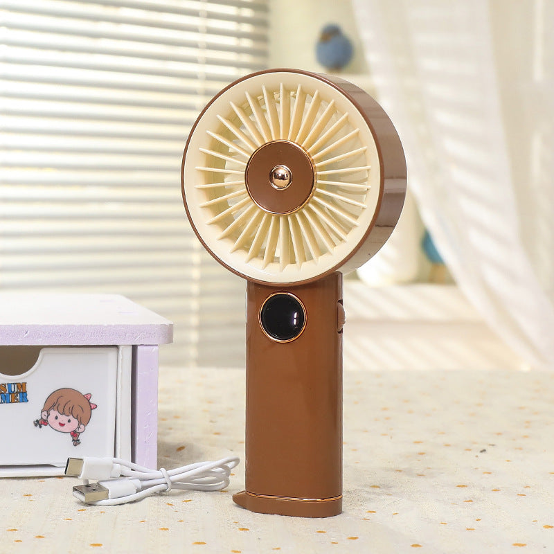 Frauen tragbarer Handventilator mit USB-Ladeoption und intuitivem Design Brehn
