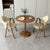 Designertisch mit Marmorplatte und stabiler Metallbasis Brehn