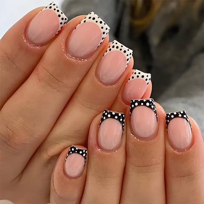 Kunstnagelset mit eleganten Punkten und modernen Akzenten Brehn
