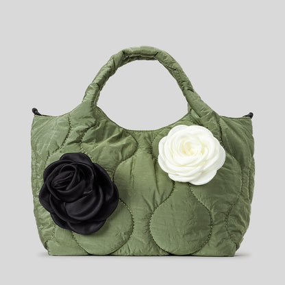 Blumengeschmückte gesteppte Handtasche