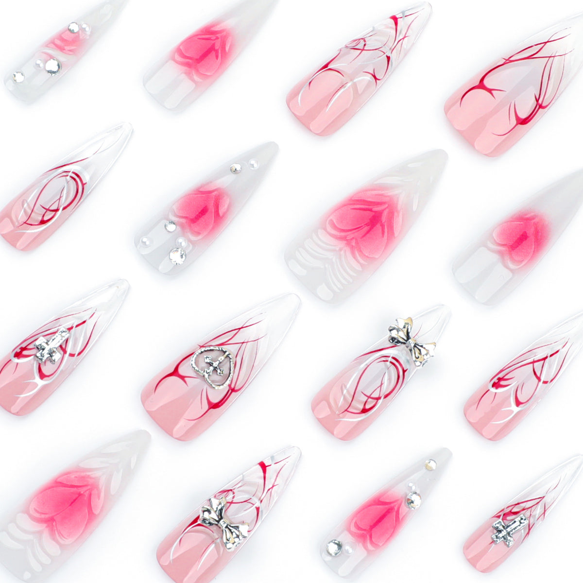 Kunstvolle Stiletto-Nägel mit eleganter floralem Akzent und Glitzerverzierungen Brehn