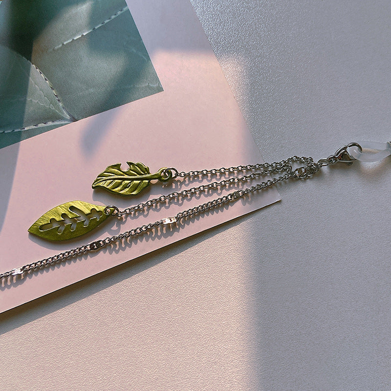 Modische Brillenhalterkette mit Blattmotiven Brehn