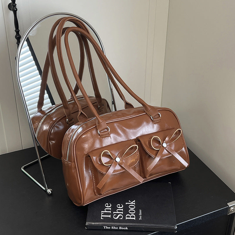 Stilvolle multifunktionale Handtasche mit Schleifendetail Brehn